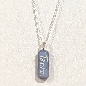 Hand crafted artisan made grey glass Tanta/ Aunt in yiddis handwritten necklace.
